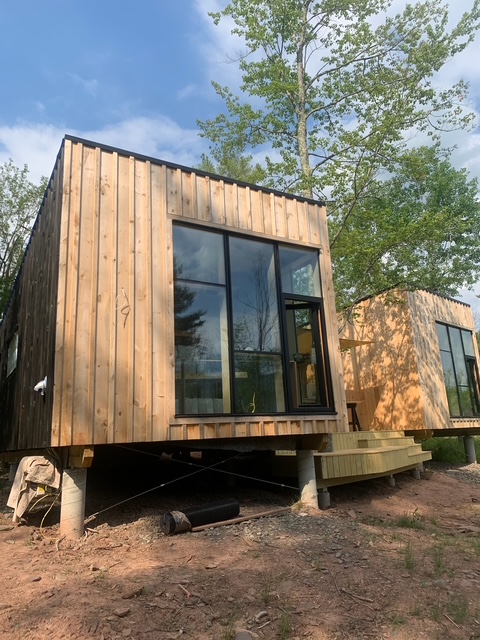 Exterior wood coating on modern cabins in Columbia County, NY Exterior wood coating on modern cabins in Columbia County, NY